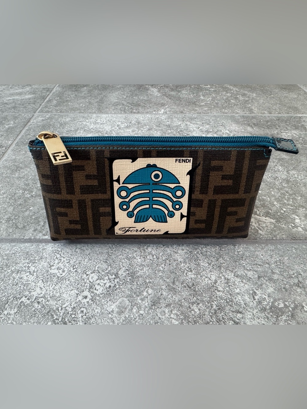 Fendi Zucca Spalmati Fortune Fish
Small pouch vintage